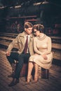 Vintage couple on train station platform Royalty Free Stock Photo