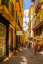 . Vintage cozy narrow streets of palma de mallorca in the sommer with many tourists