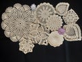 Vintage crochet doilies cotton on black background