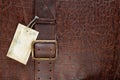 Vintage crocodile leather textured background with price tag blank. Retro style photo