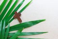 Vintage crucifix cross on palm leaves Royalty Free Stock Photo