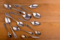 Vintage cutlery. different spoons on wooden background. Antique silverware. Retro Royalty Free Stock Photo