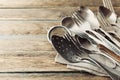 Vintage cutlery on rustic background, old kitchen tools Royalty Free Stock Photo