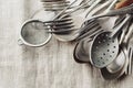 Vintage cutlery on rustic background, old kitchen tools Royalty Free Stock Photo