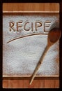 Vintage cutting board covered with flour. space for recipe menu text on old wooden background