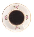 Vintage czech porcelain cup of coffee on saucer, old style rich decorated, isolated on a white background, close up, top view