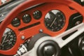 Vintage dashboard with various gauges on a retro car Royalty Free Stock Photo