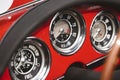 Vintage dashboard with various gauges on a retro car Royalty Free Stock Photo