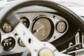 Vintage dashboard with various gauges on a retro car