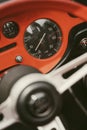 Vintage dashboard with various gauges on a retro car Royalty Free Stock Photo