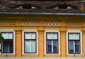 Vintage decorated faÃÂ§ade with eyes on the roof in Sibiu Romania