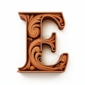 Brown 3d Carved Letter E - Ornate Wood Design Royalty Free Stock Photo