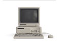 Vintage Desktop PC with Floppy Drive Keyboard and Mouse Isolated on a White Backgro.und