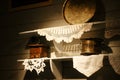 Vintage details on wooden shelfs on wall in modern rustic cafe