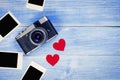 Vintage Digital Camera on Blue wooden background.