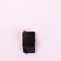 Vintage digital compact camera on pink pastel color Royalty Free Stock Photo