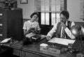 Vintage director and secretary working together at desk Royalty Free Stock Photo
