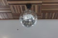 Vintage disco mirror ball hanging on roof Royalty Free Stock Photo