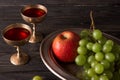 Vintage dishes with grape, apple and wine Royalty Free Stock Photo