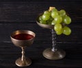 Vintage dishes with grape, apple and wine Royalty Free Stock Photo