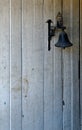 Vintage door bell on the wooden wall Royalty Free Stock Photo
