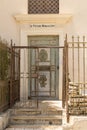 Vintage door and a fragment of the facade