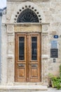 Vintage door and a fragment of the facade