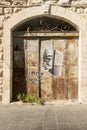 Vintage door and a fragment of the facade