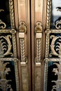 Vintage door handles on decorative doors Royalty Free Stock Photo