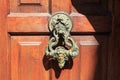 Vintage door knocker on the door in Bran Castle (Dracula\'s Castle). Transylvania. Romania Royalty Free Stock Photo