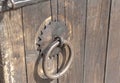 Vintage door lock of external antique wooden door with a door knocker, weathered on a Country house Royalty Free Stock Photo