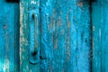 Vintage door pull handle on weathered scratched wooden surface. Concept of security and privacy protection. Textured grunge