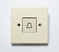 Vintage doorbell switch on gray background