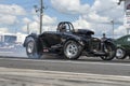 Vintage drag car on the track making a burnout