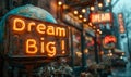 Vintage Dream Big! neon sign on a rusty mailbox in an urban setting with blurred city lights and storefronts in the