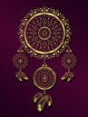 Vintage dreamcatcher with feathers and jewelry in a gold ornament Royalty Free Stock Photo