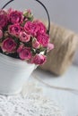 Vintage dried roses, napkin and tight twine