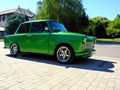 Vintage East German made restored green small two stroke car in side view