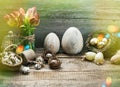 Vintage easter decoration with golden eggs and red tulip flowers Royalty Free Stock Photo