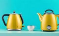 Vintage electric kettle against a vivid backdrop. Royalty Free Stock Photo