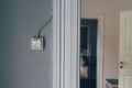 Vintage electric light switch on bedroom wall Royalty Free Stock Photo