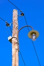 Vintage electric pole in village Drvengrad Mecavnik - Serbia Royalty Free Stock Photo