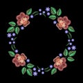 Vintage embroidery wreath with viola forget me not. Vector fashion ornament on black background for textile, fabric traditional f