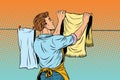 Vintage employee hangs up to dry clothes