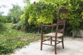 Vintage empty chair in the green park Royalty Free Stock Photo