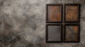 Vintage empty picture frames arranged on a textured concrete wall, creating a rustic and artistic decor composition Royalty Free Stock Photo