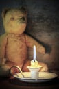 Vintage Enamel Candle Holder with Old Teddy Bear Behind