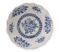 Vintage English porcelain. Very old saucer with blue floral decor, top view, close up