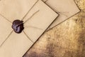 Vintage envelope with a wax seal on the table Royalty Free Stock Photo