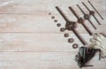 Locksmith vises, dies of different diameters and work gloves on a wooden background. Royalty Free Stock Photo